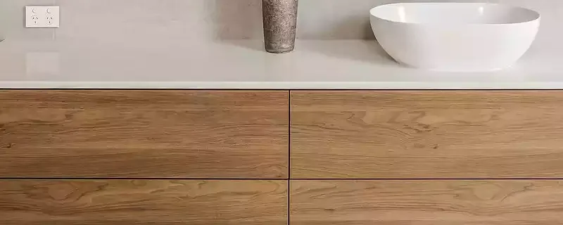 Timber vanity drawer fronts with the grain running across them